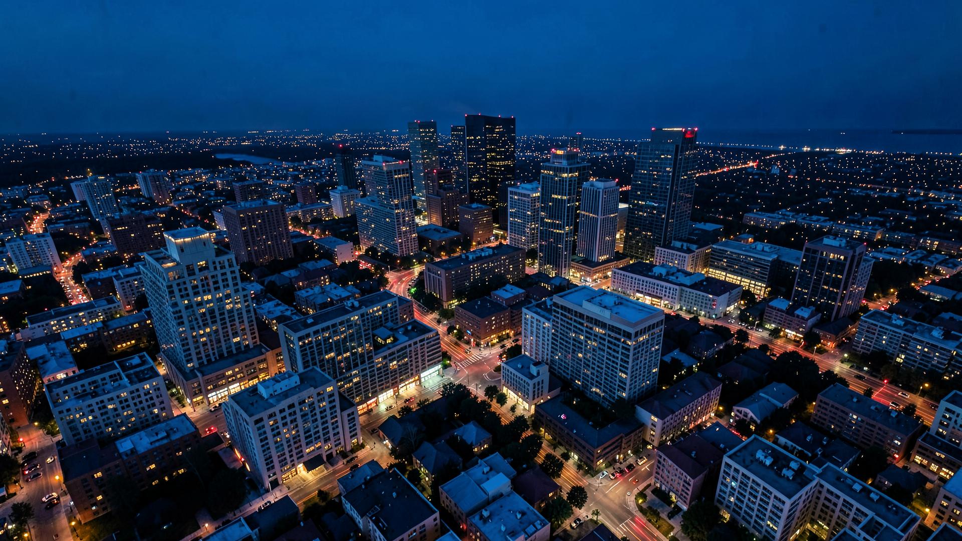 Aerial view of a U.S. city skyline at dusk